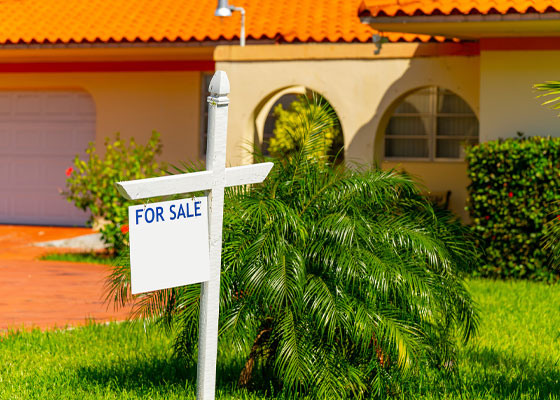 stock photo house with for sale sign
